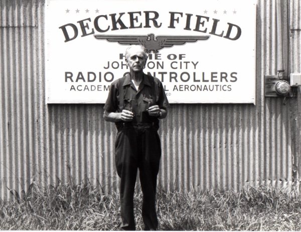 Dick Decker holding Uncle Billyâ€™s grafting knife and leather punch. illus27.