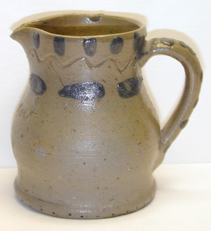 Side view of A Present pitcher. ai14.